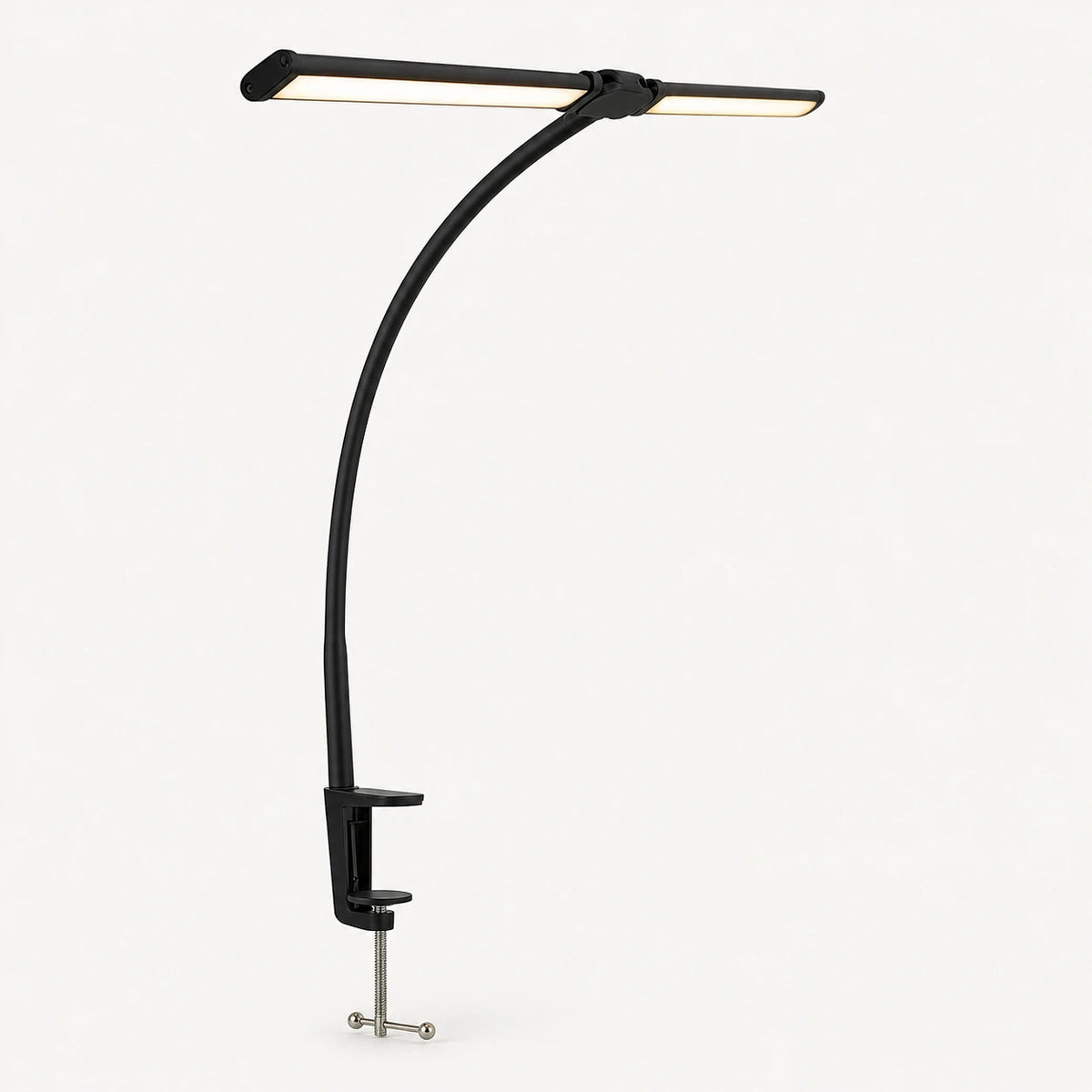 Black LED desk lamp with secure screw clamp on a light neutral background
