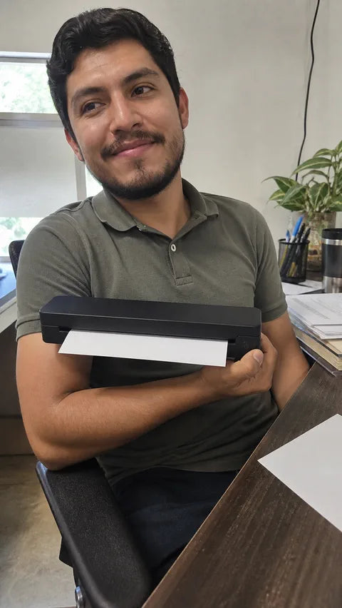 Real estate professional with the black PAUD portable printer
